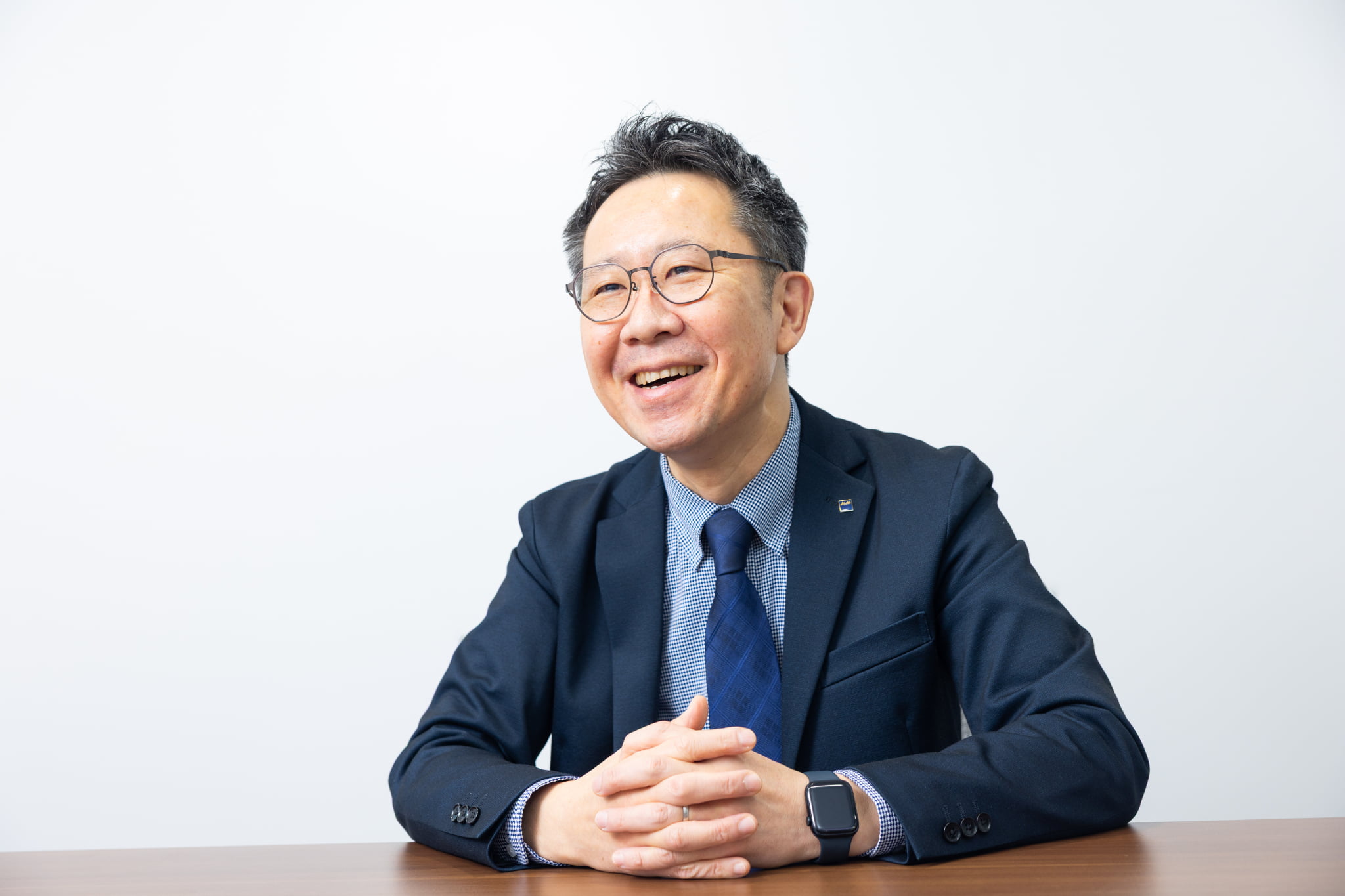 「受講実績ある上司の勧めで決意。グループワークもメリット大」と語るアサヒロジ株式会社 宗像 雄司 氏