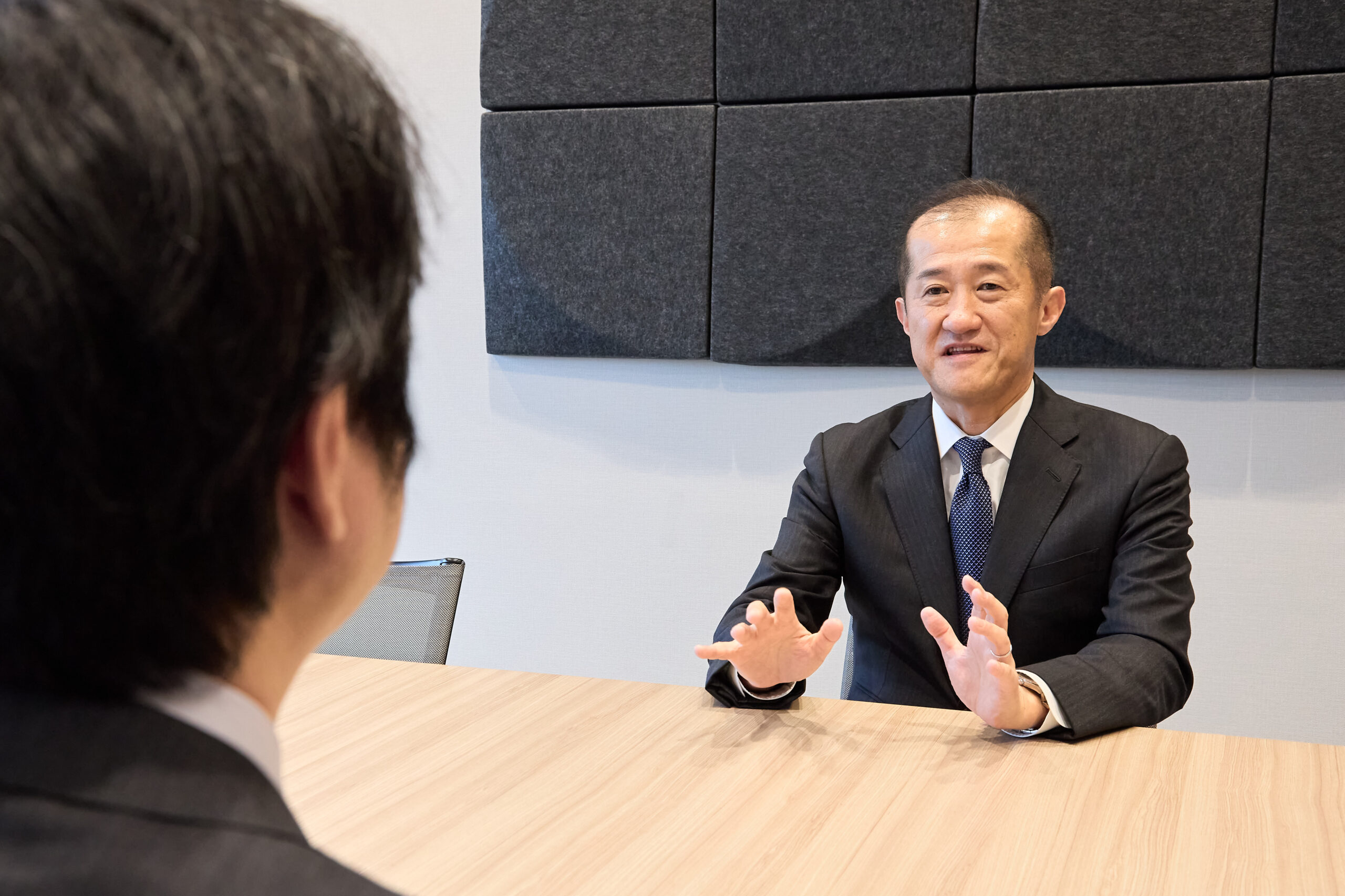 「JILSへの再入会と、産官学連携による課題解決」について語る三井物産株式会社 奥村 隆 氏